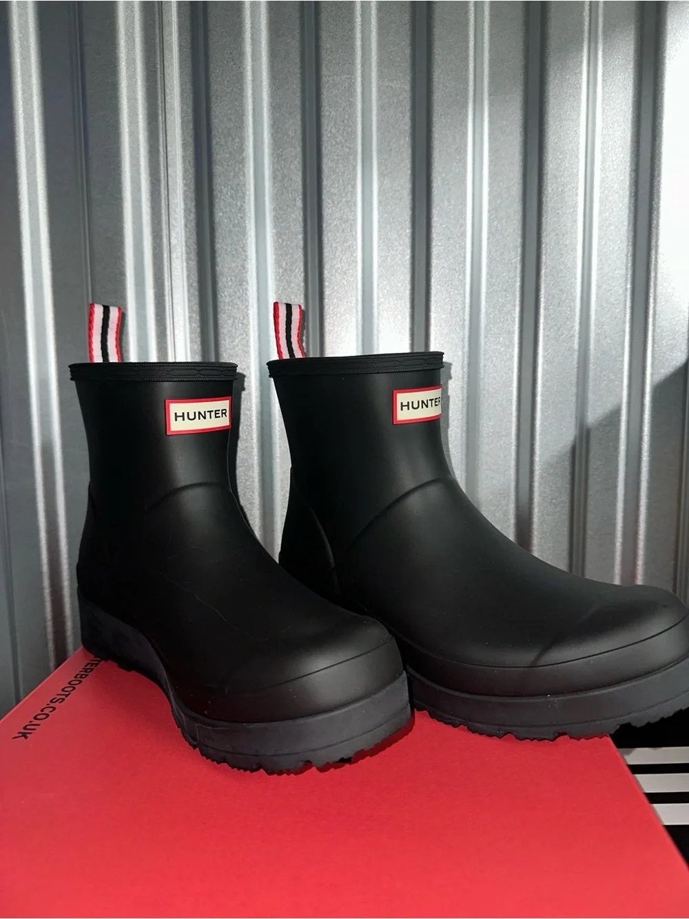 Hunter Black Short Rain Boots with Red-Trim Pull Tabs